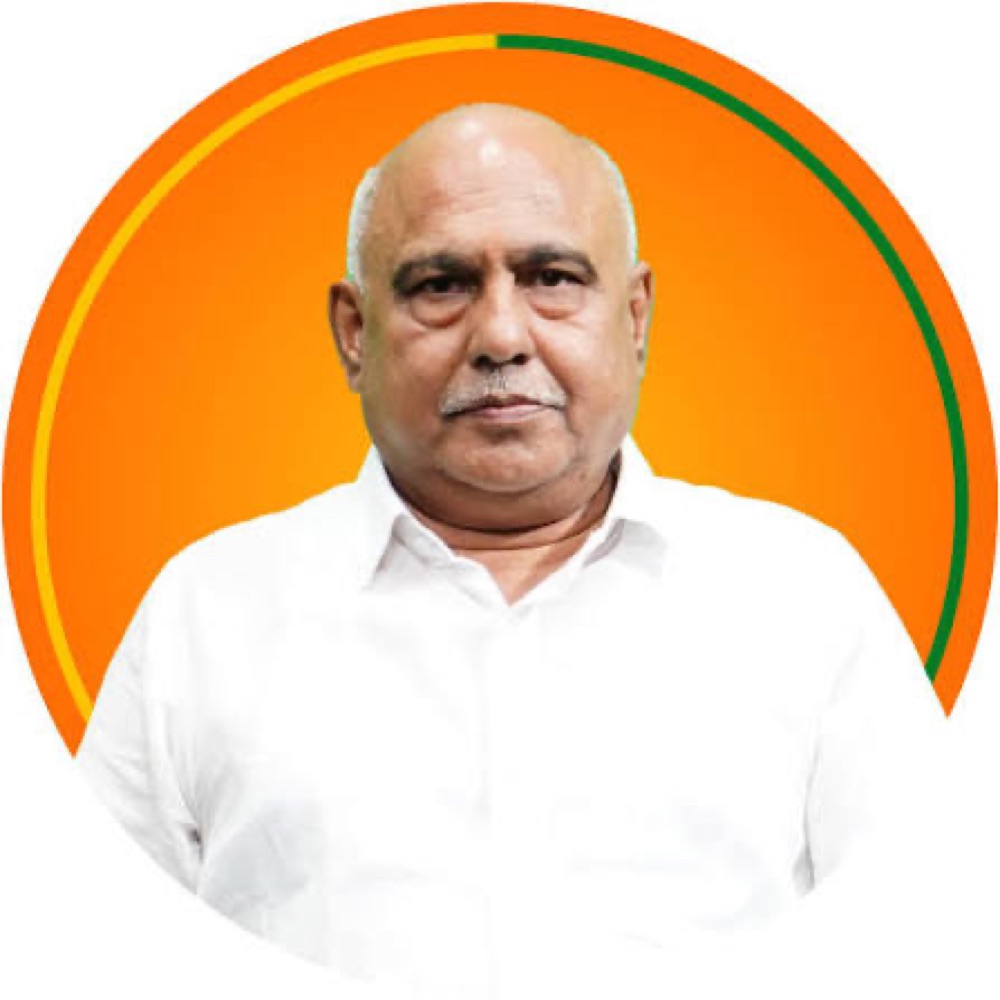 Portrait of Hemant Khandelwal against a circular party-coloured background
