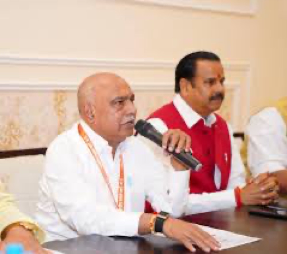 Hemant Khandelwal addressing a press conference beside a colleague